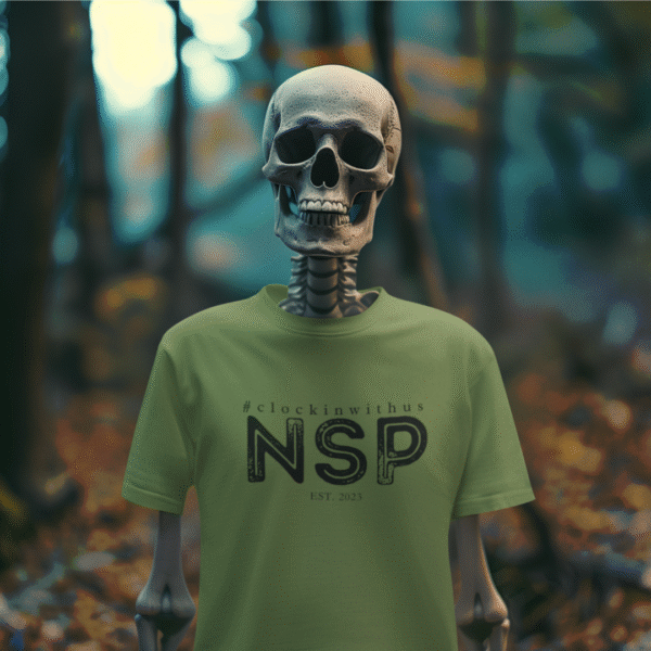 Military green t-shirt with the Night Shift Paranormal logo printed on the chest, shown in a flat lay display.